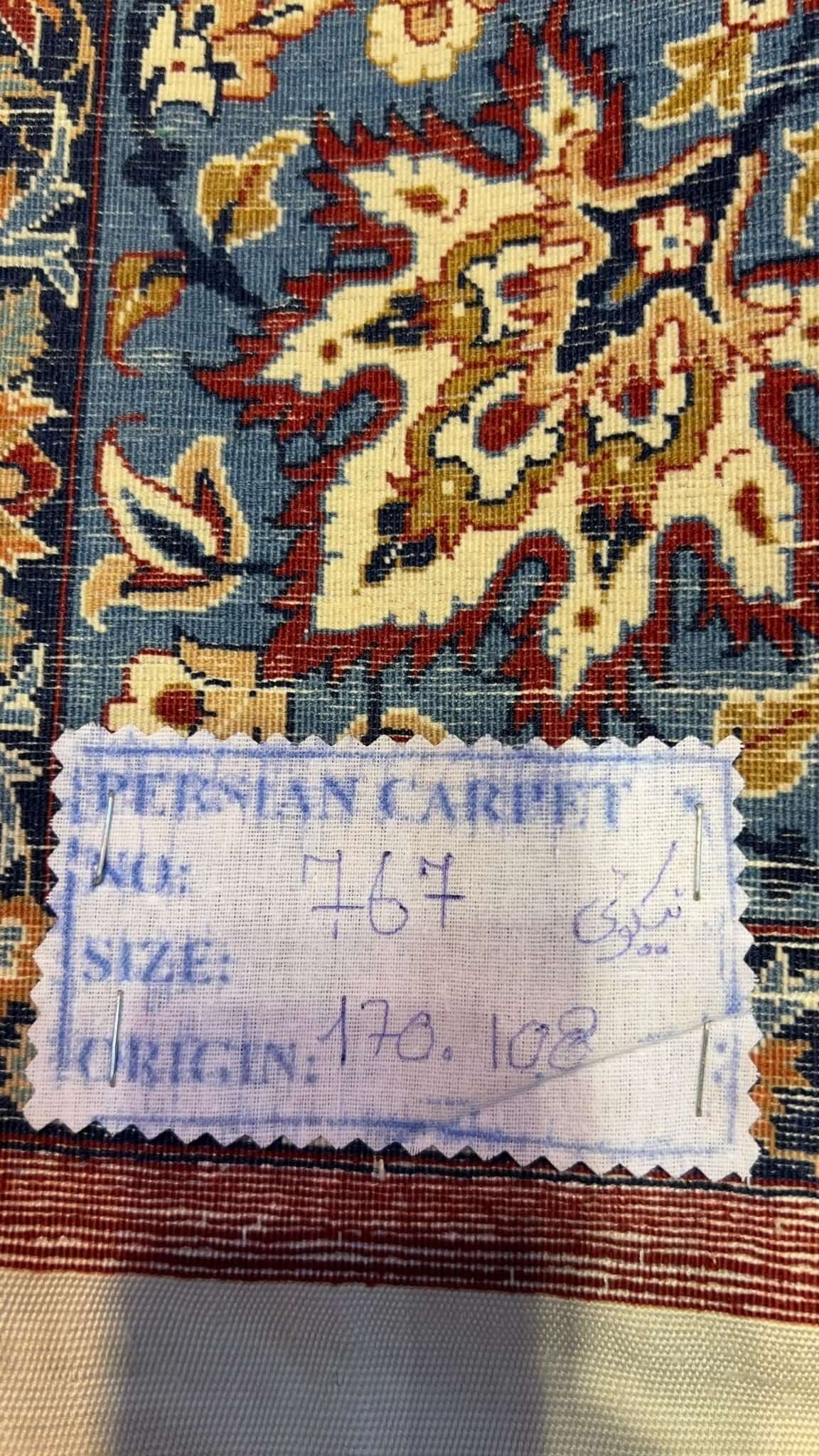 Backside view of the Hassan Seirafian Pictorial rug, showcasing the high knot density and silk warp craftsmanship.